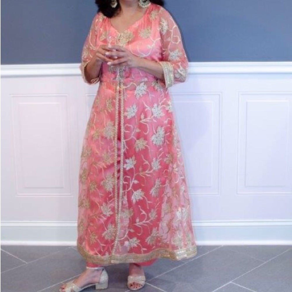 Coral all over embroidered kurta with palazzo pants.